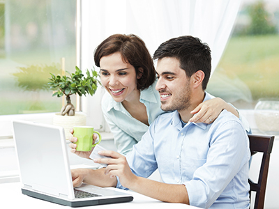 Couple with laptop